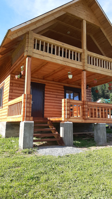 Коттедж с террасой и балконом