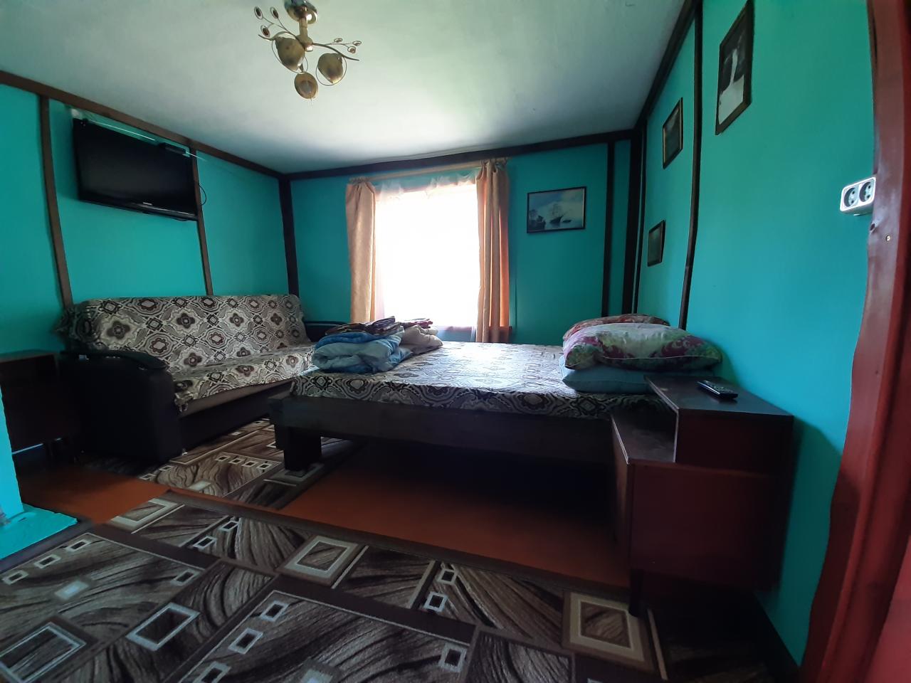 Семейный номер с видом на озеро, спальня