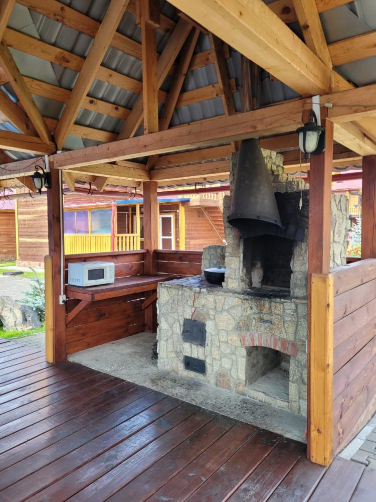 Беседка с печью барбекю