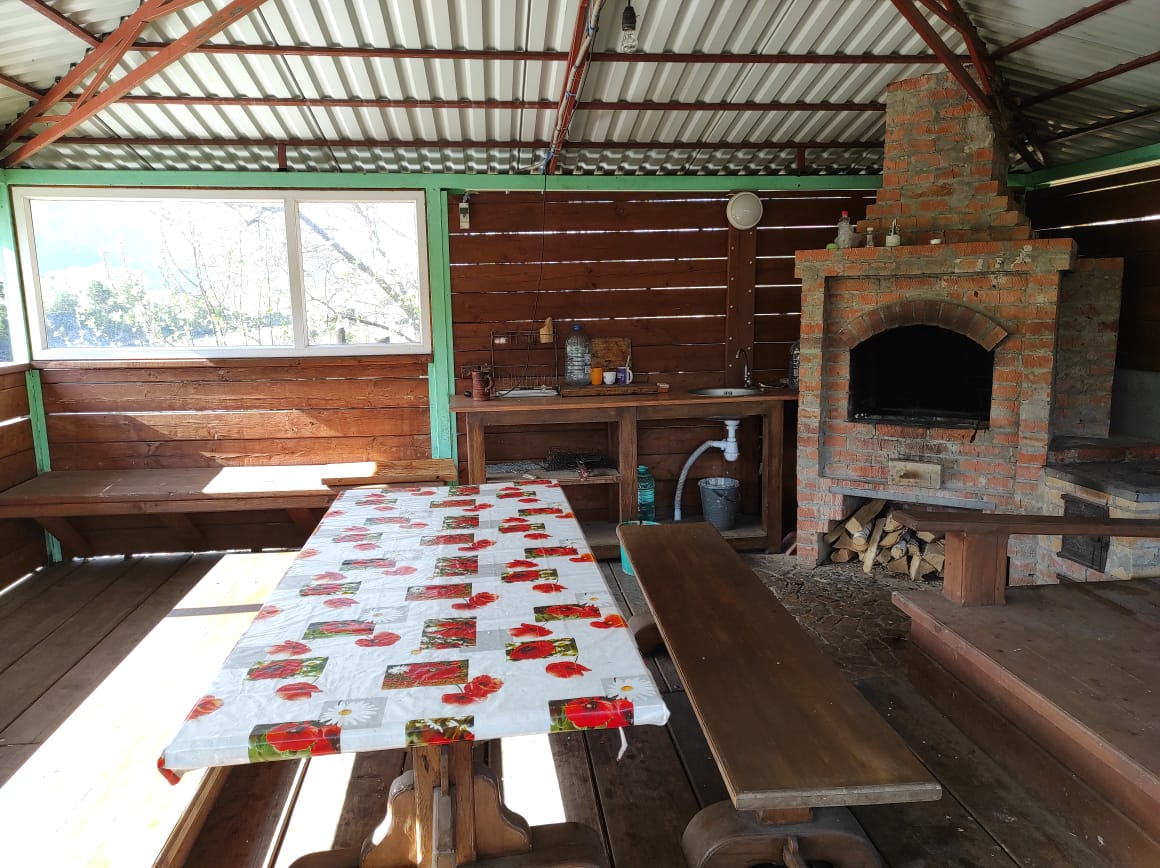 Беседка с печью-барбекю у реки