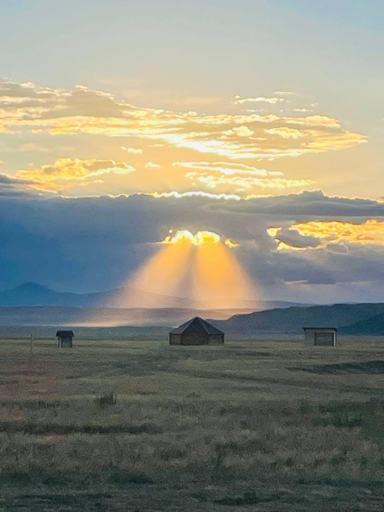 Солнце через облака
