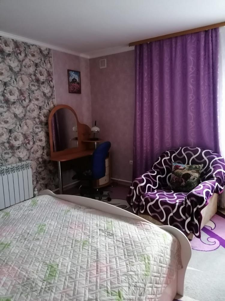 Гостевой дом с камином на Алтае в Чемале