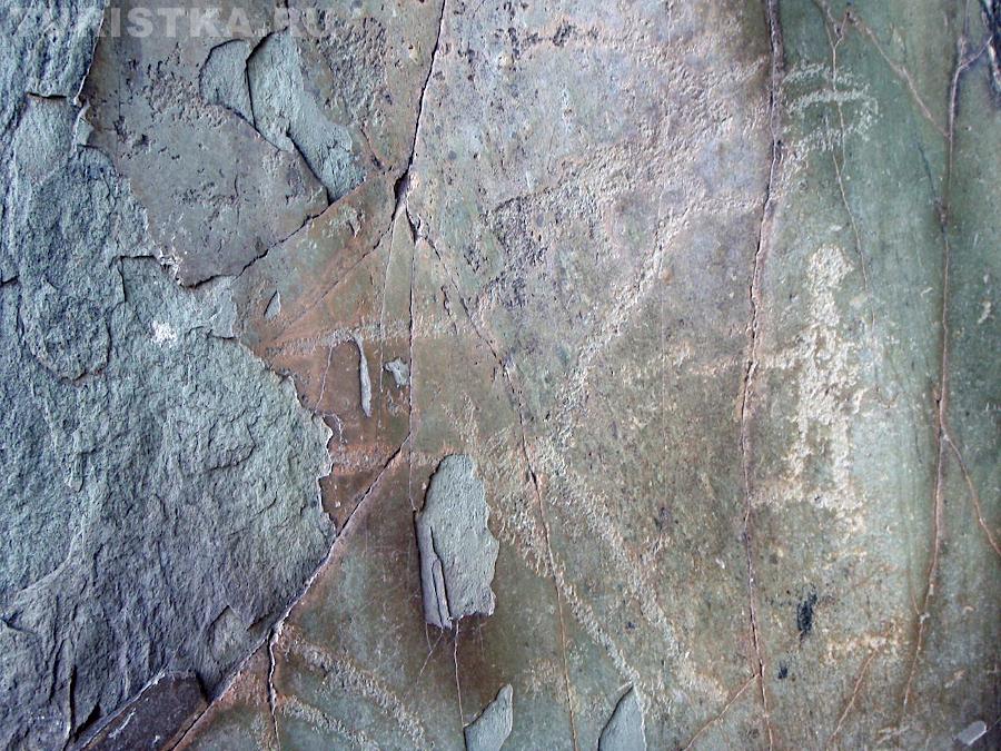 Петроглифы Куюсского грота 