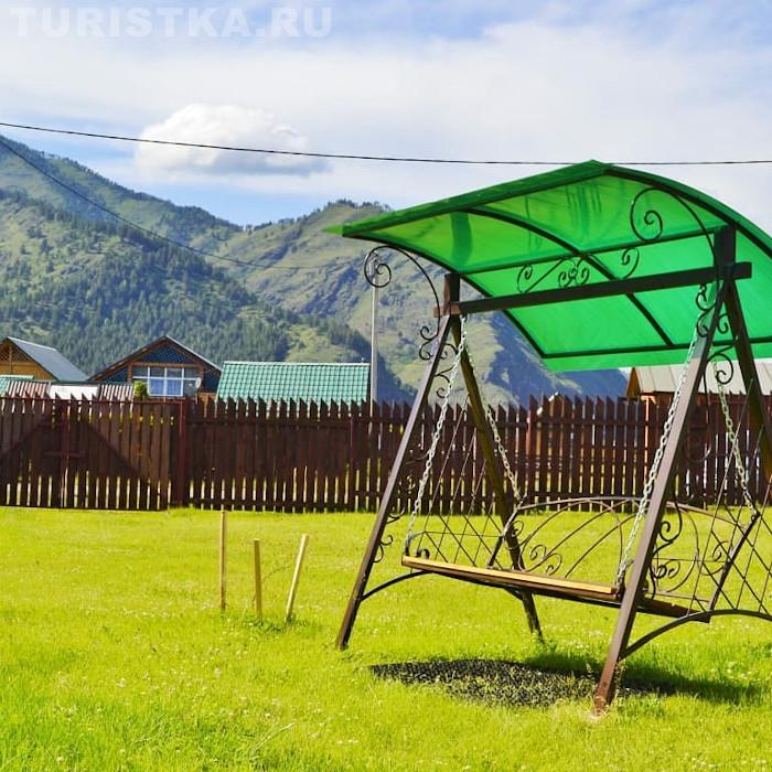 Качели на территории