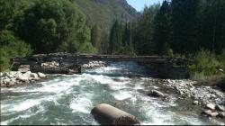 Разрушенный мост через реку Мульта