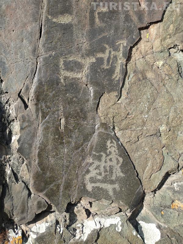 Петроглифы Куюсского грота 